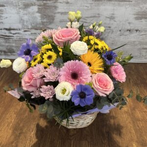 Basket of Sunshine using fresh seasonal blooms