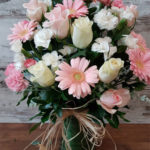 vase soft pink and white flowers raffia bow