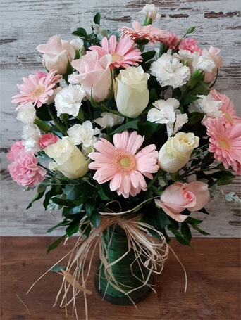 vase soft pink and white flowers raffia bow