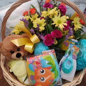 Gift basket of flowers and baby products
