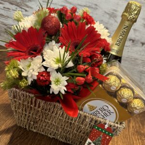 Weave gift hamper with red Christmas arrangement, wine and chocolates