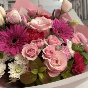 Pastel florist choice bouquet in soft pink and seasonal flowers for same day delivery in Toowoomba